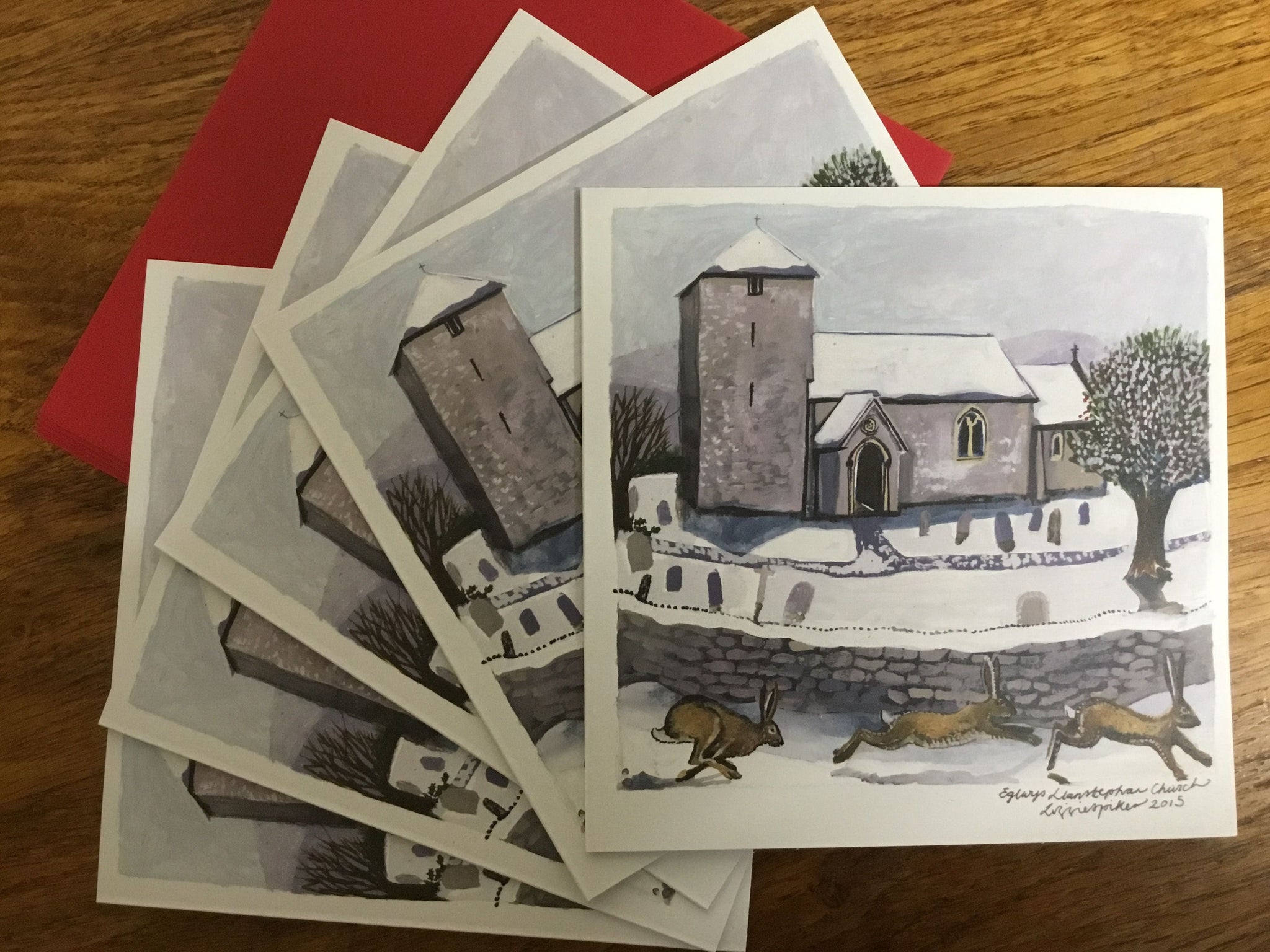 'Church and Hares' Christmas Cards by Lizzie Spikes